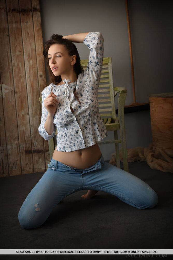 Sweet brunette teen Alisa Amore removes blue jeans on way to modeling naked - #1