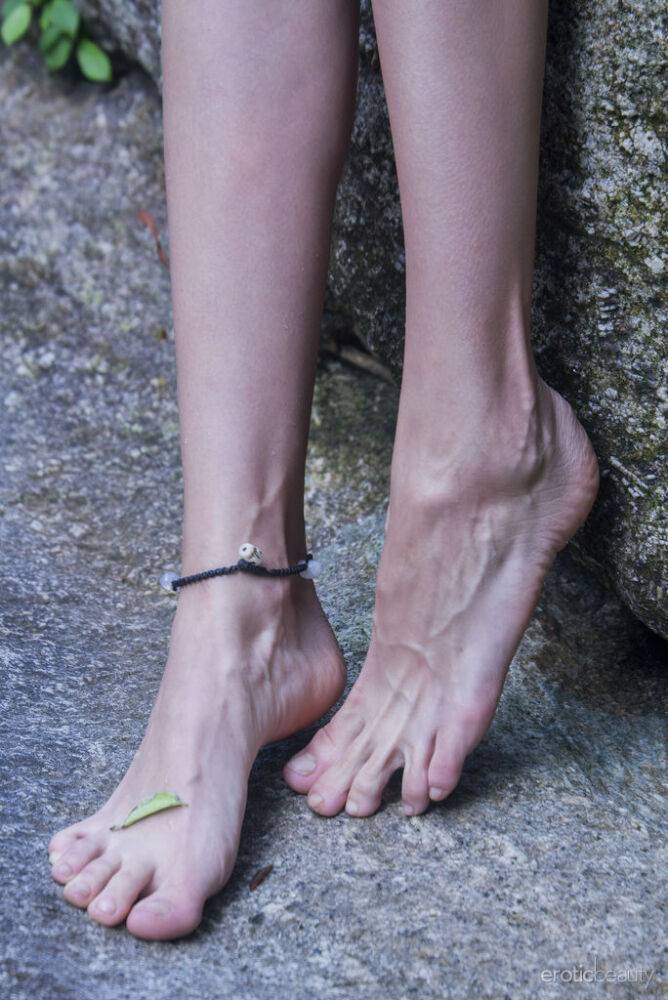 Thin teen Alisa M goes barefoot while posing totally naked in the forest - #4