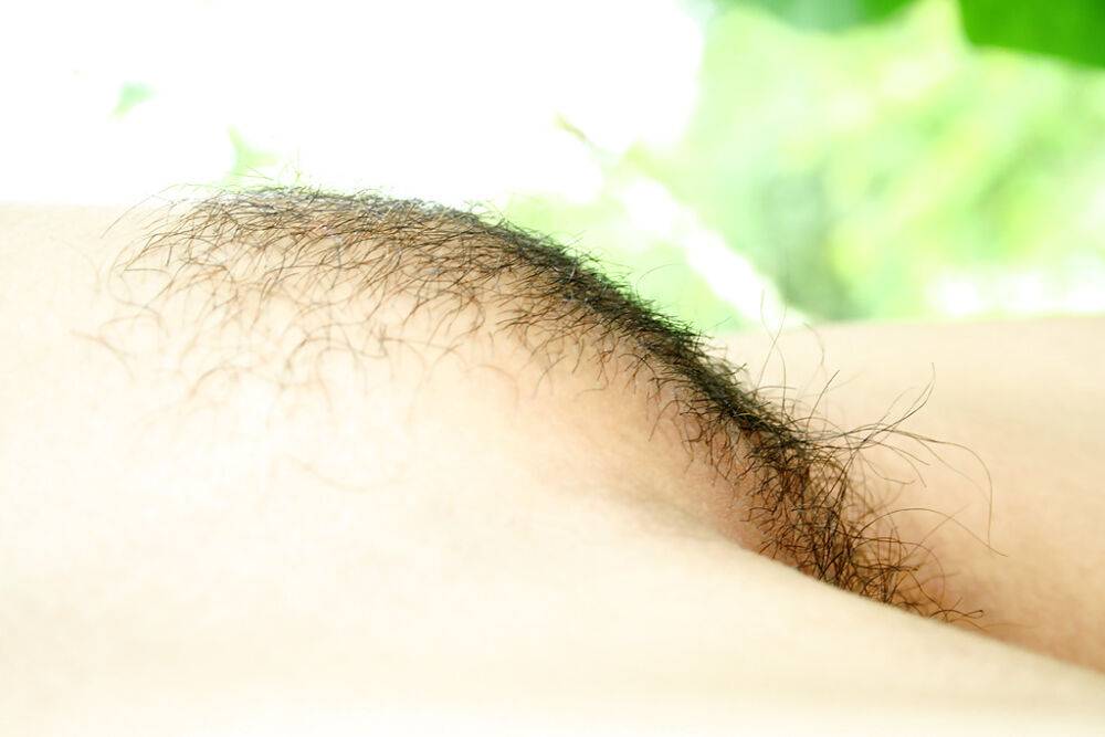 Close up posing outdoor from an Asian babe with hairy pussy - #1