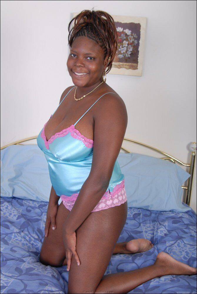 Black plumper frees her big natural tits from satin lingerie as she gets naked - #15