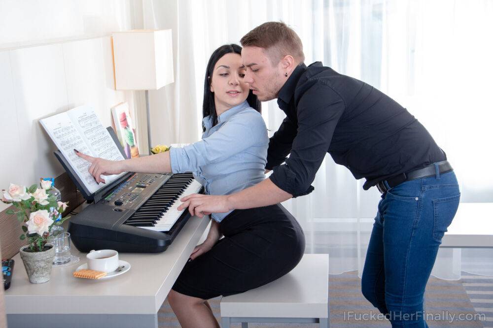 Dark haired teen hikes up her black skirt for intercourse with music tutor - #11