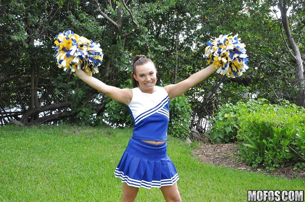 Amateur cheerleader Tiff Bannister shows off in a sexy uniform - #9