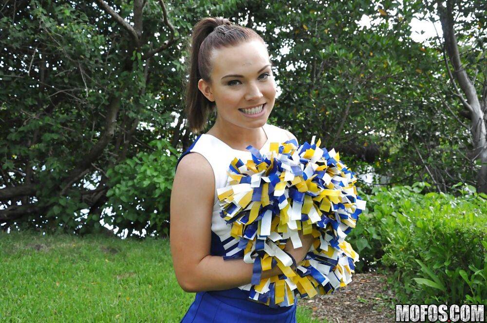 Amateur cheerleader Tiff Bannister shows off in a sexy uniform - #4