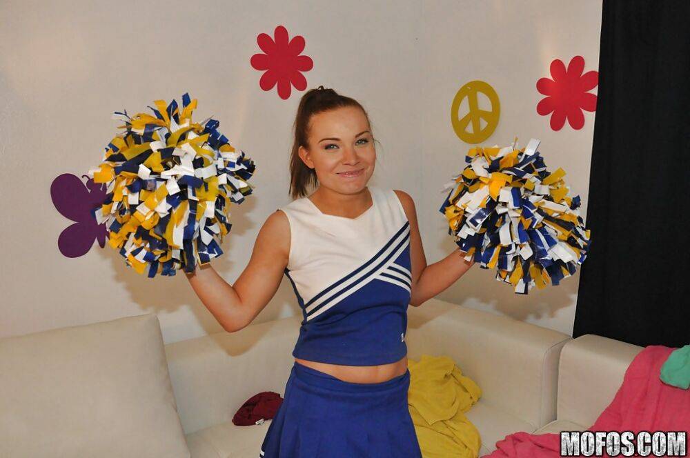 Amateur cheerleader Tiff Bannister shows off in a sexy uniform - #10