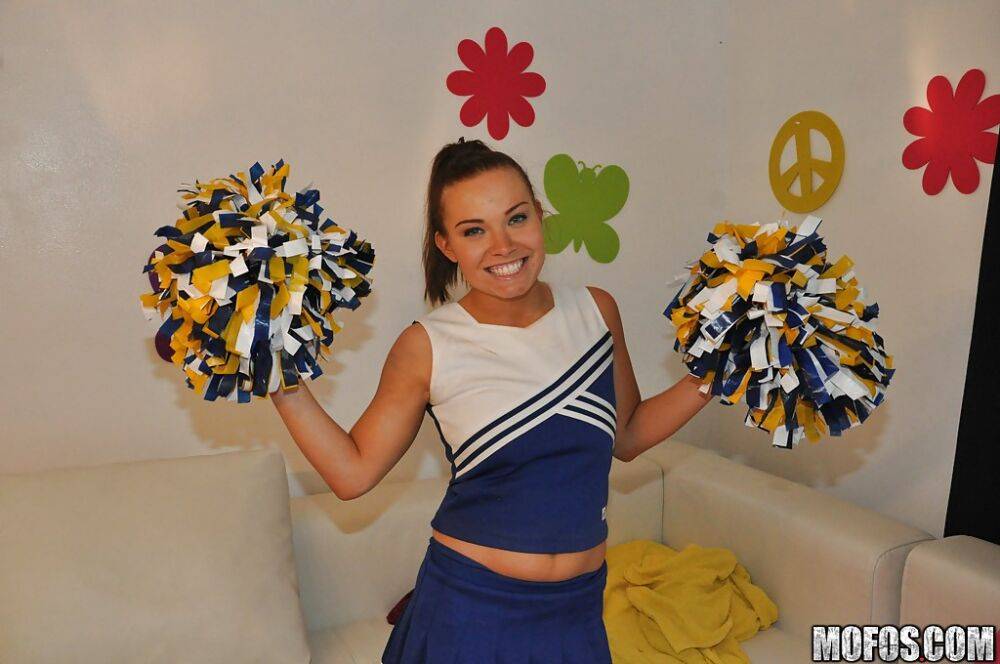 Amateur cheerleader Tiff Bannister shows off in a sexy uniform - #8