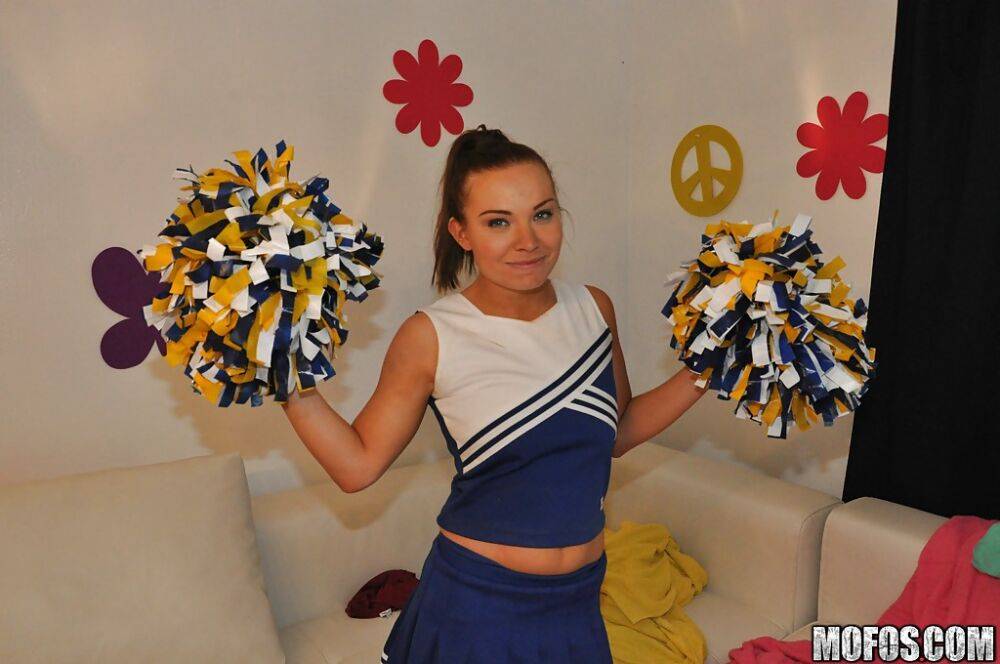 Amateur cheerleader Tiff Bannister shows off in a sexy uniform - #7