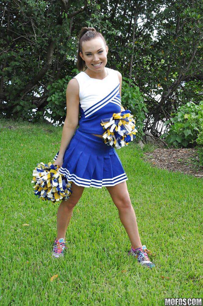 Amateur cheerleader Tiff Bannister shows off in a sexy uniform - #6