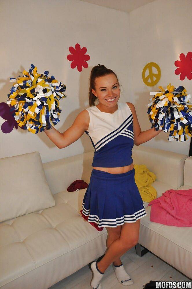Amateur cheerleader Tiff Bannister shows off in a sexy uniform - #5