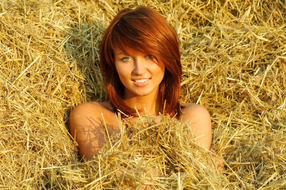 Barely legal redhead Charmian I models totally naked on top of a pile of straw - #15