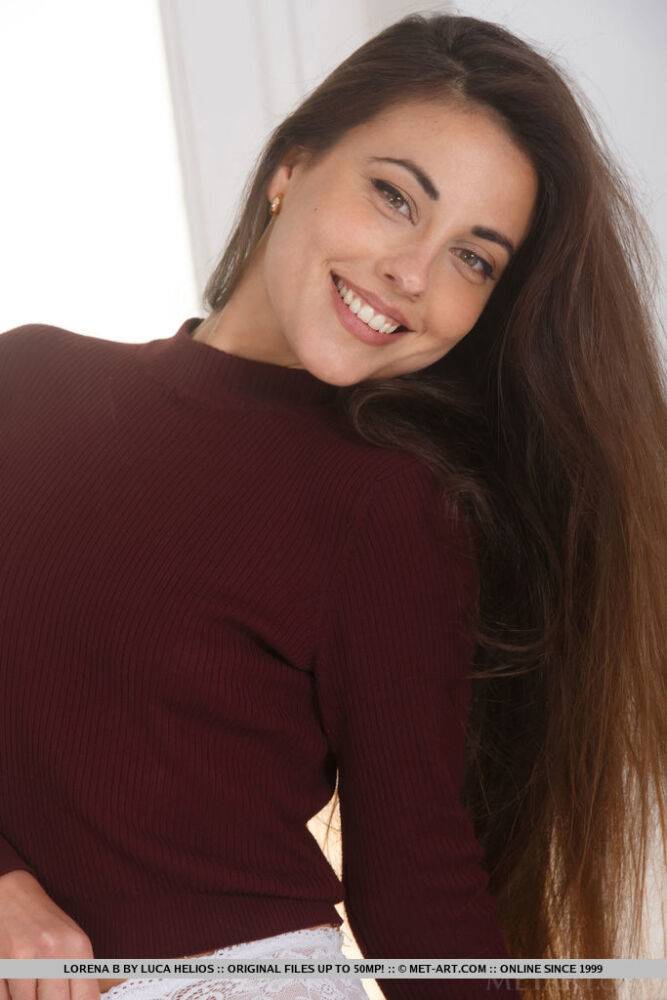 Nice young girlLorena B sports a nice smile while showing her legs - #5