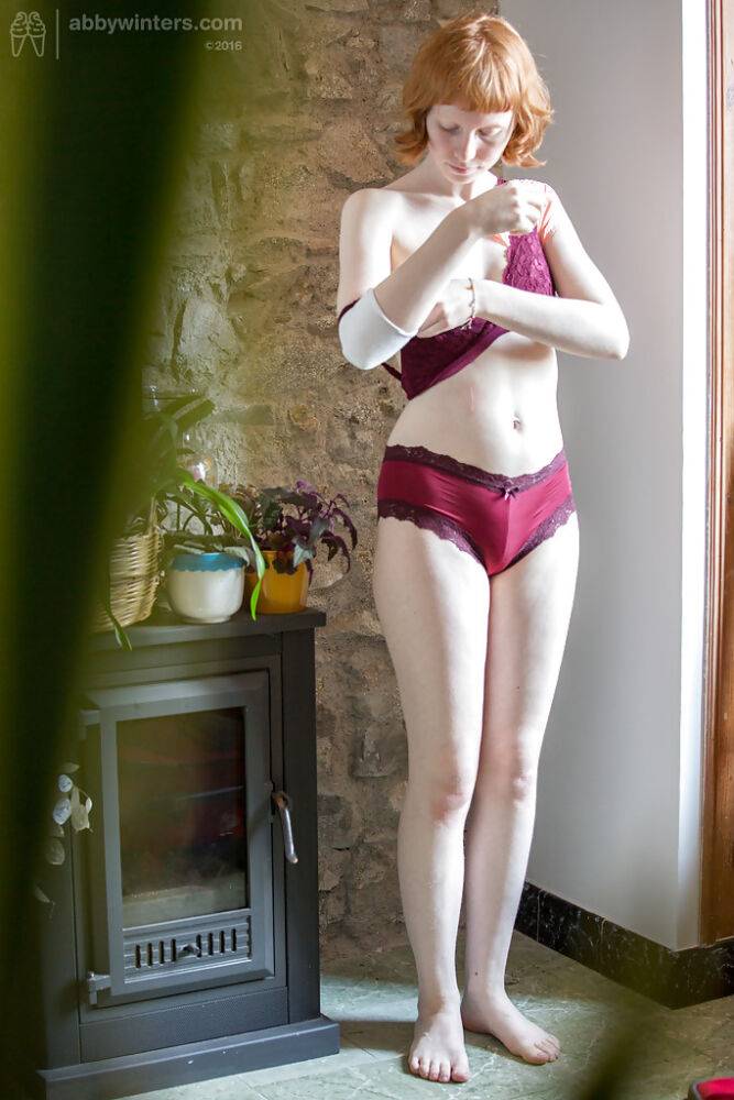 Skinny redheaded chick Emma B recorded getting dressed by hidden camera - #9