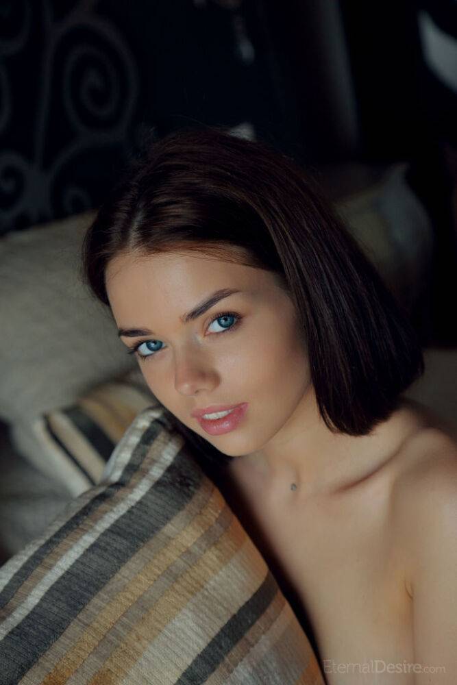 Nice teen Keira B strikes great poses during a totally nude shoot on a bed - #1