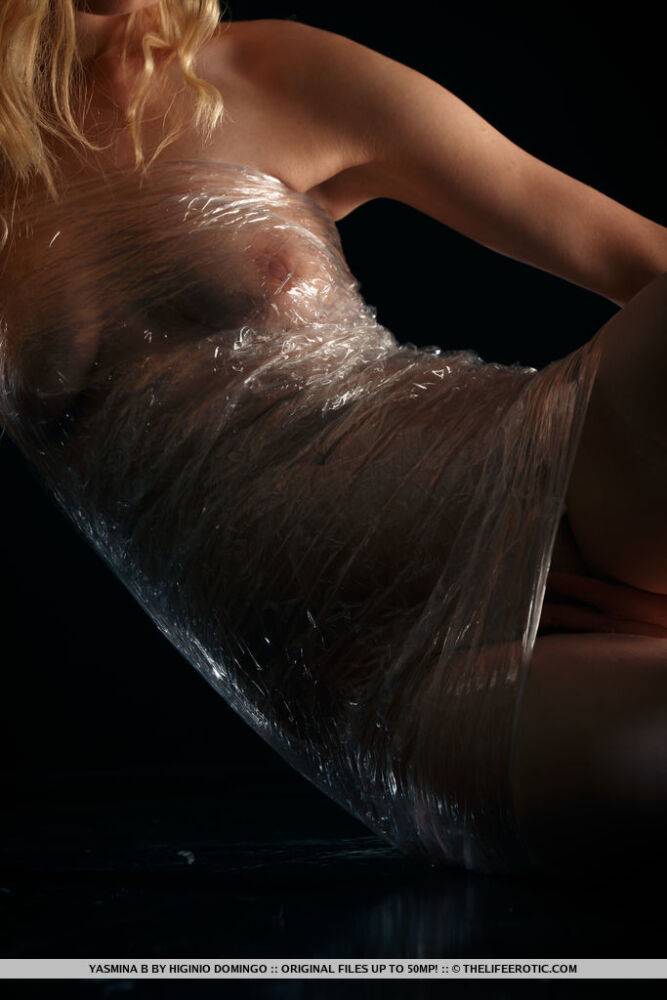 Sexy blonde teen Yasmina B touches her bald slit while wrapped in plastic wrap - #3