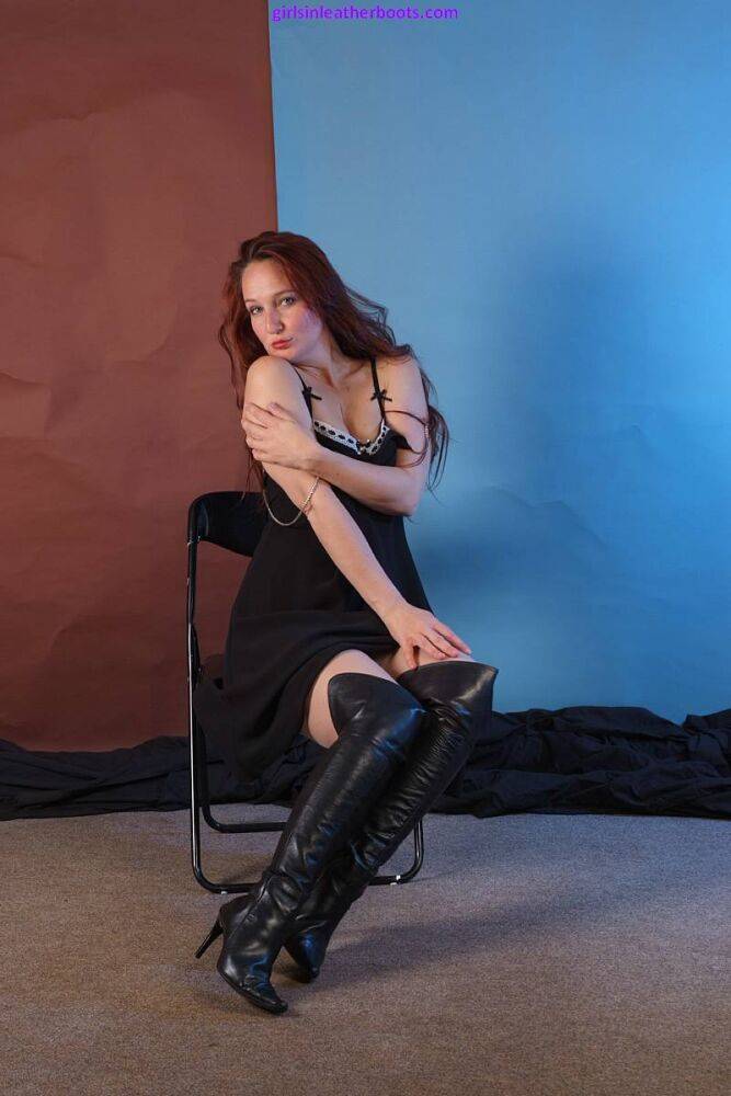 Natural redhead Sammi B models lingerie in black leather OTK boots - #11