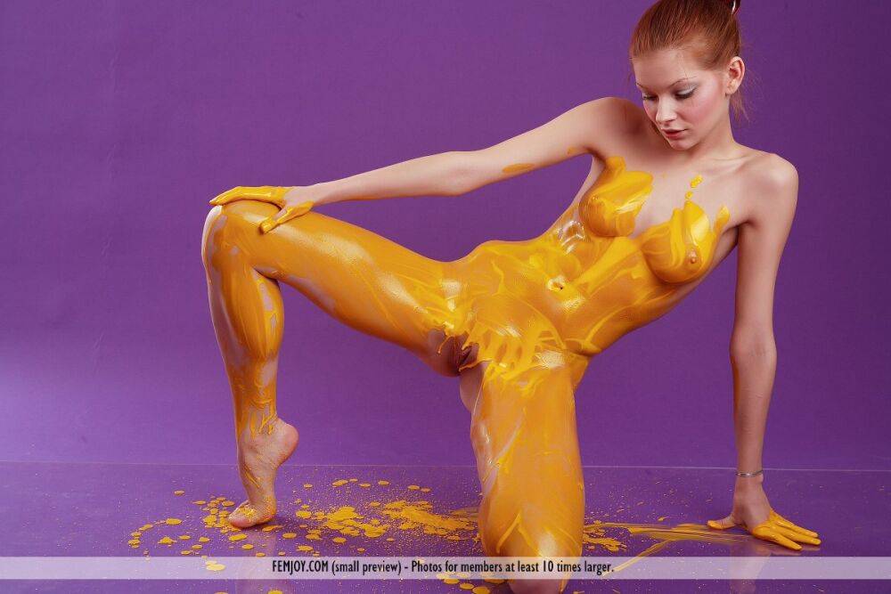 Slender redhead Angelina B covers her totally naked body with body paint - #9