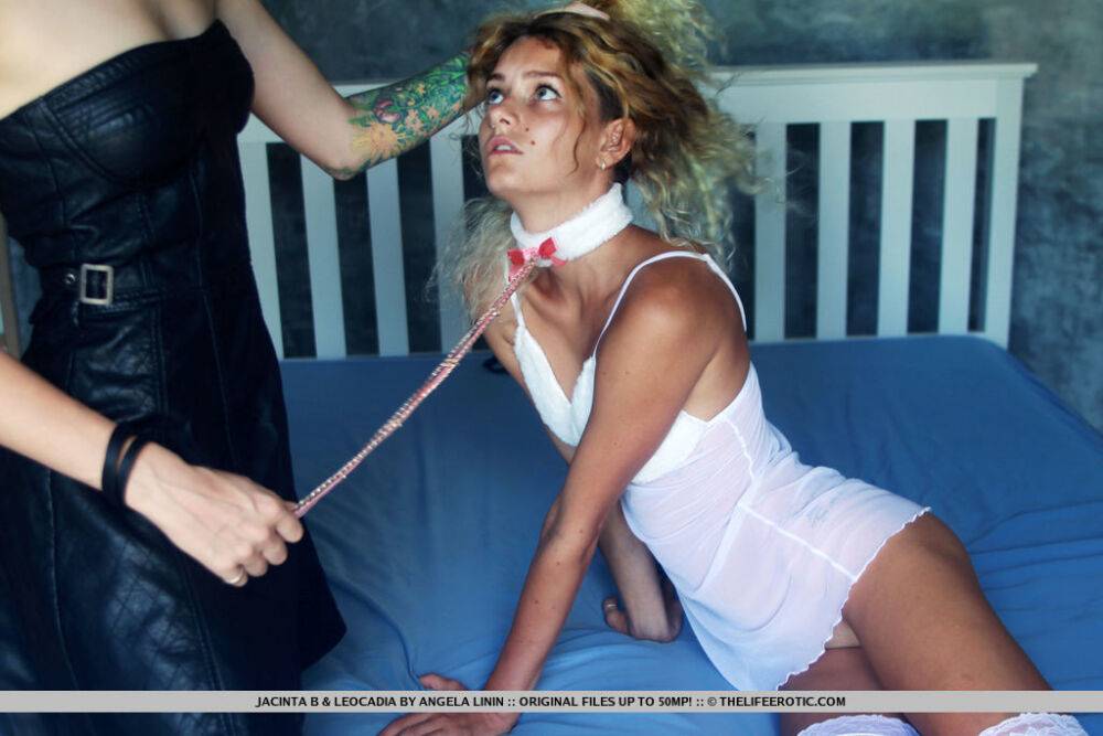 Young blonde finds herself being tied up in white stockings by a lesbian - #7