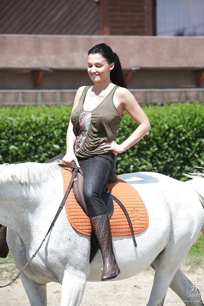 Pornstar Aletta Ocean is riding a horse outdoor in glasses - #13