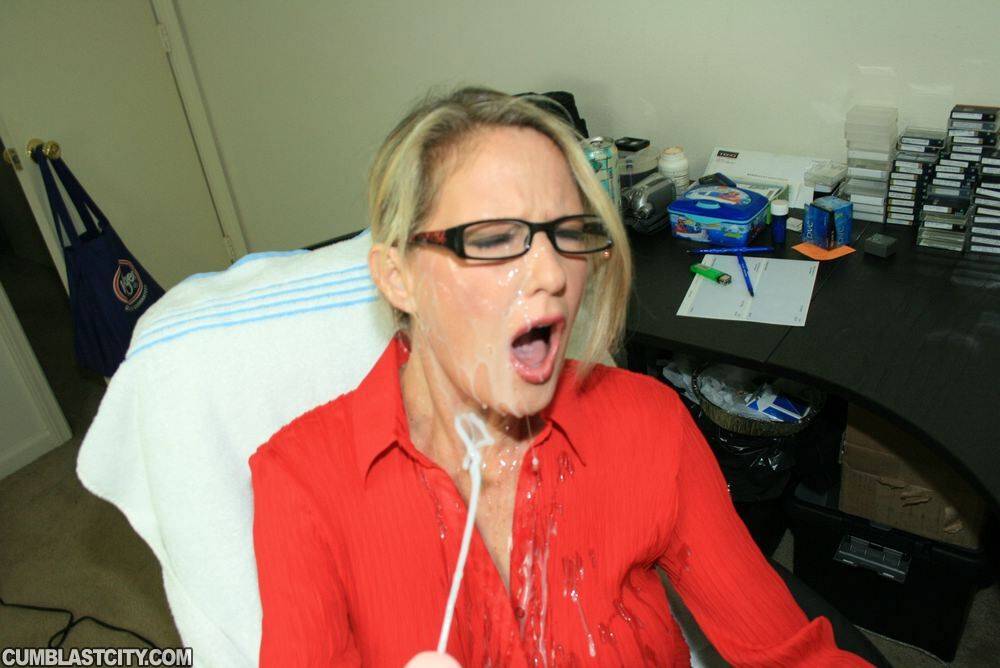 Fully clothed mature blonde in glasses gives a handjob and gets bukkaked - #1