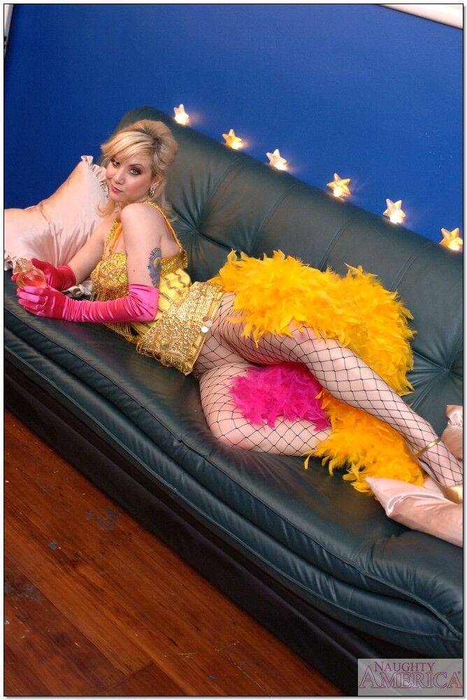 Flexible college girl Karina Kay posing in fishnet pantyhose and corset - #9