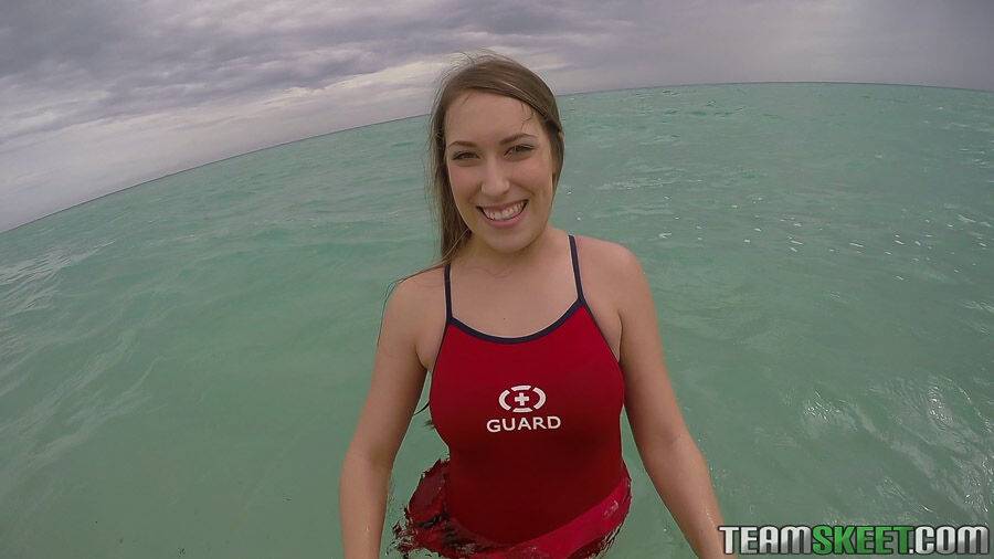 Teen babe Kimber Lee flashing large natural tits in the ocean - #10