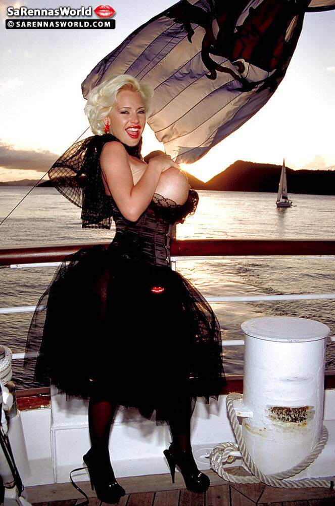 MILF pornstar SaRenna Lee loosing huge boobs from vintage clothes on boat - #12