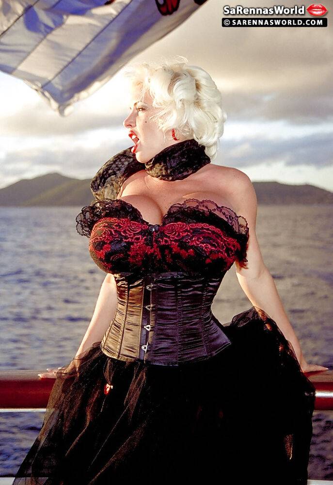 MILF pornstar SaRenna Lee loosing huge boobs from vintage clothes on boat - #14