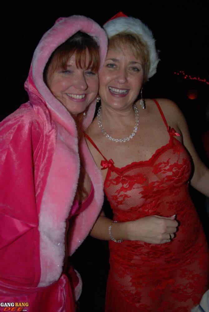 Mature lady Dee Delmar and friends hit the swing club for Christmas orgy - #11
