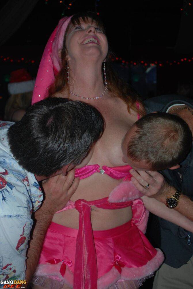 Mature lady Dee Delmar and friends hit the swing club for Christmas orgy - #5