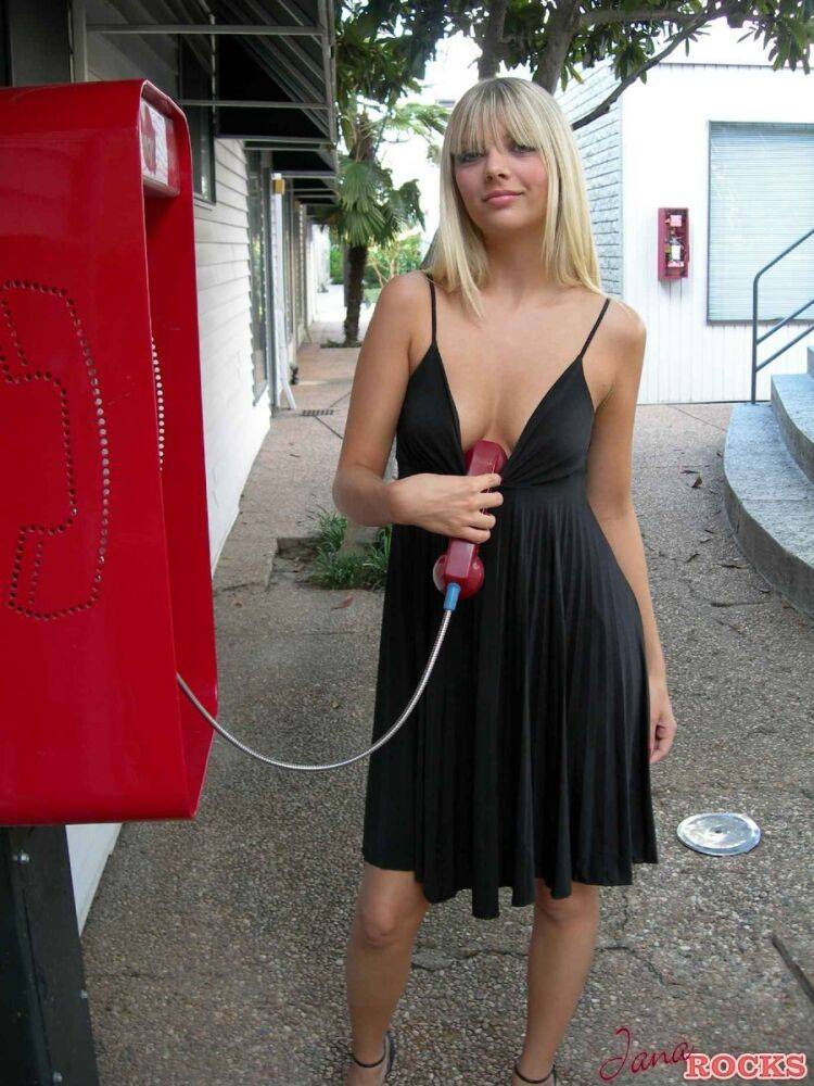 Blonde amateur Jana Jordan flashes her panties at a public phone - #7