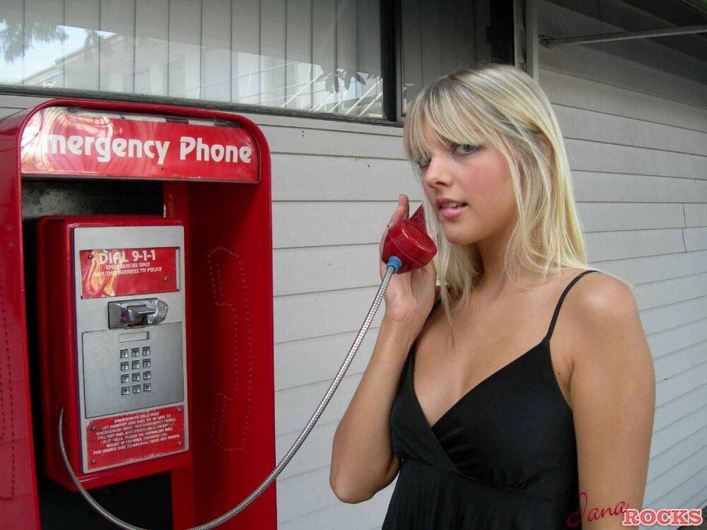 Blonde amateur Jana Jordan flashes her panties at a public phone - #10