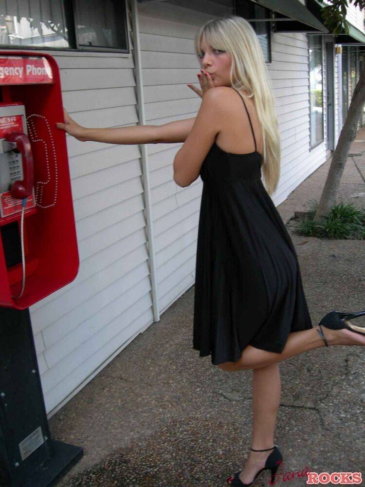 Blonde amateur Jana Jordan flashes her panties at a public phone - #5