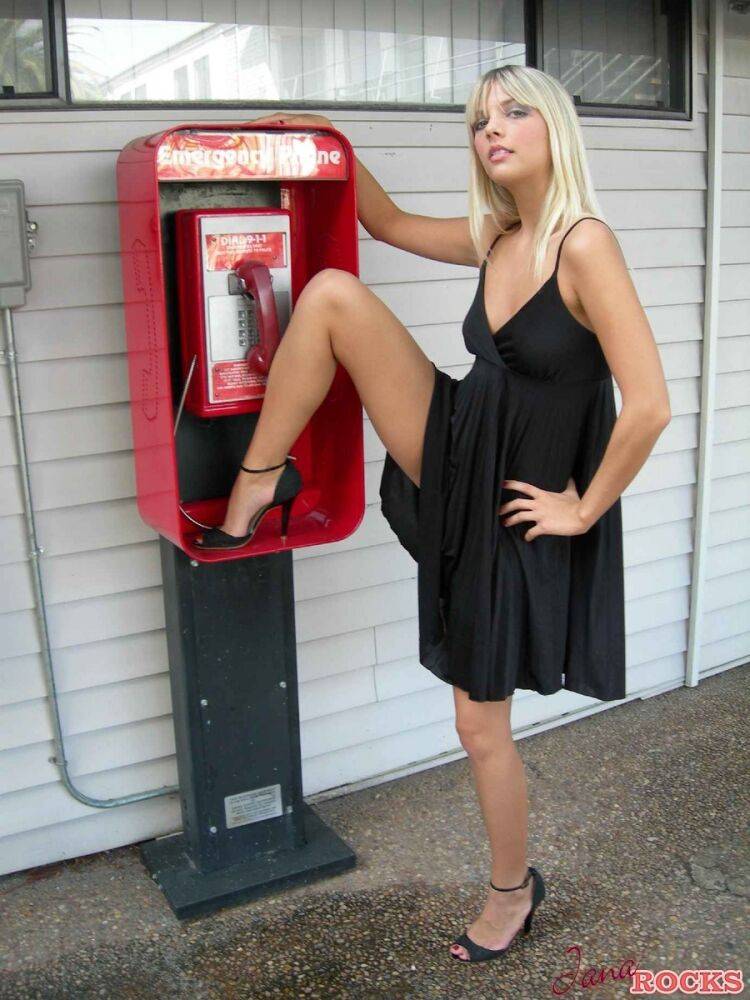 Blonde amateur Jana Jordan flashes her panties at a public phone - #11