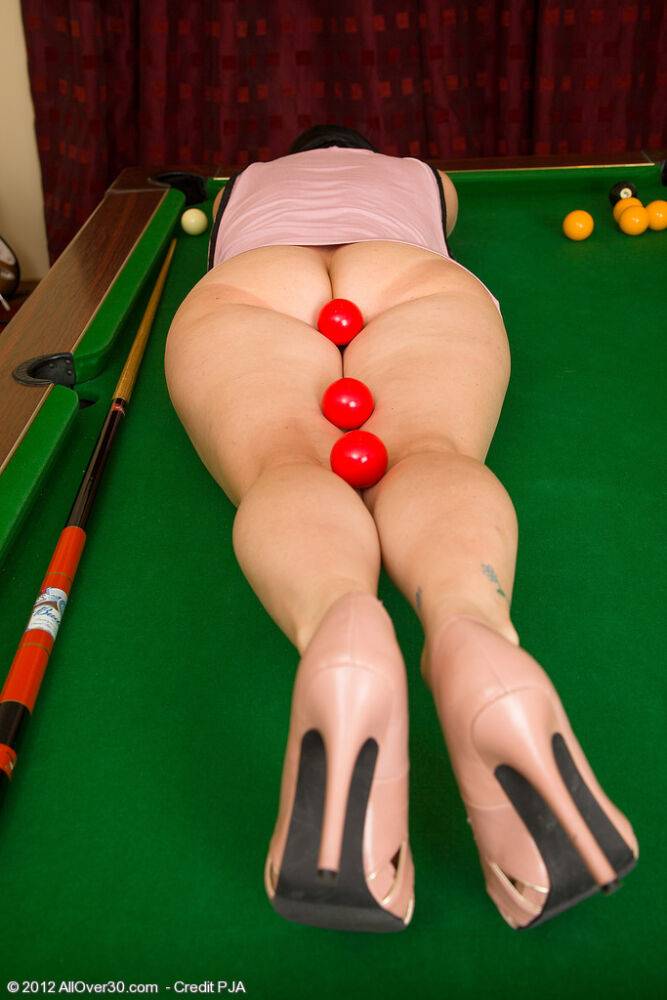 Middle-aged woman Amber L poses totally nude atop pool table - #15