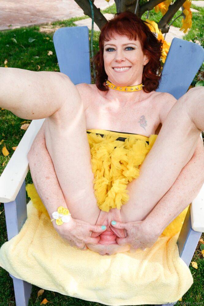 Redhead woman Amber Rayne stretches out her pussy in bumblebee outfit - #9