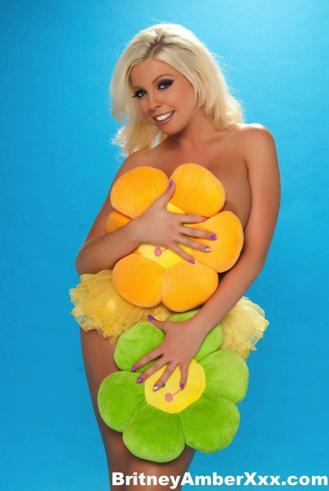 Platinum blonde chick Britney Amber rocks her big tits and twat in a tutu - #13
