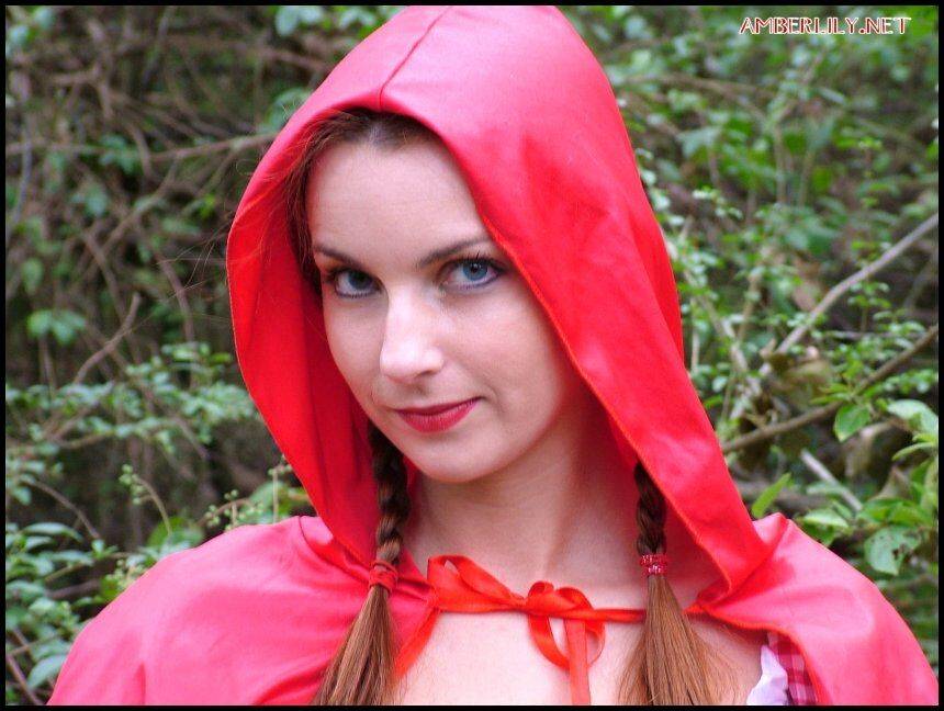 Amateur girl Amber Lily frees tits and twat from Little Red Riding Hood outfit - #11