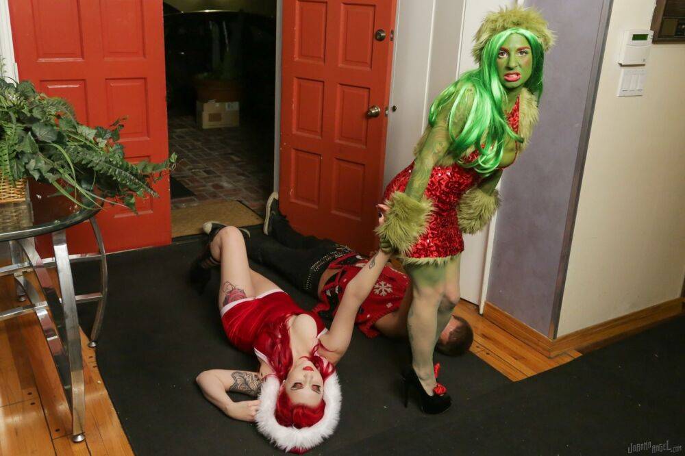 Tattooed redhead fucks a thick cock during kinky cosplay sex at Christmas - #7