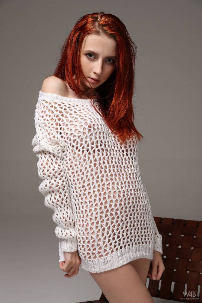 Beautiful redhead Helga Grey in sheer sweater flaunting her perfect big tits - #1