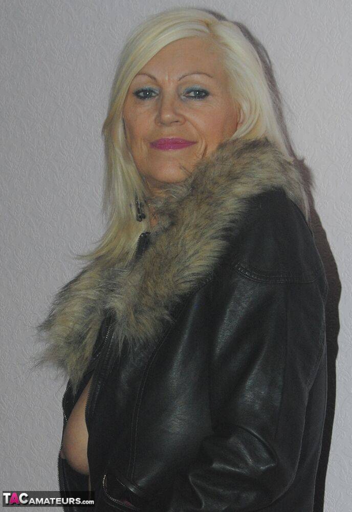 Older slut Platinum Blonde doffs leather jacket to reveal her huge saggy boobs - #7