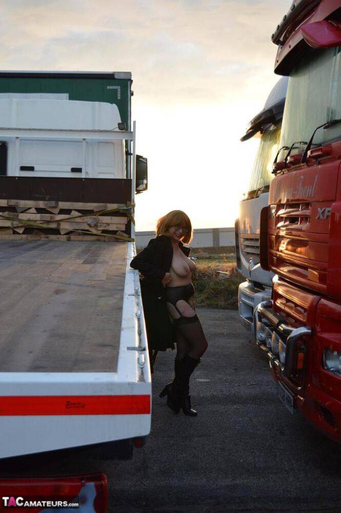 Mature redhead Barby Slut exposes herself to a lorry driver while flashing - #1