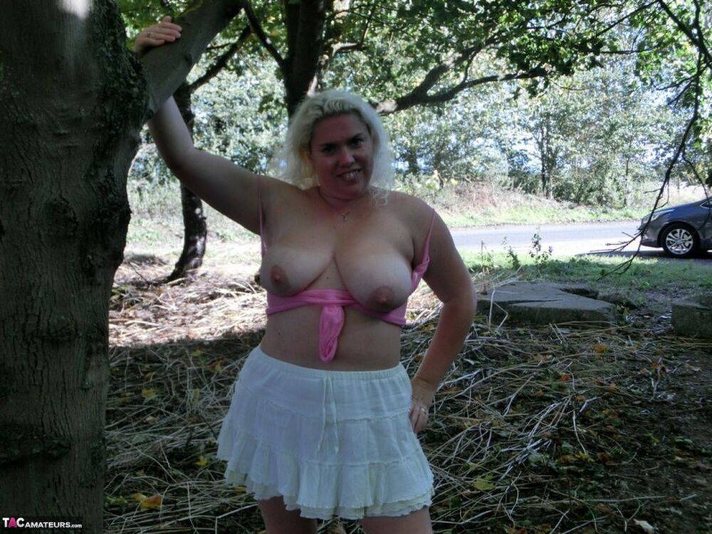 Thick blonde Barby bares her saggy boobs and bald cunt in a rural location - #13