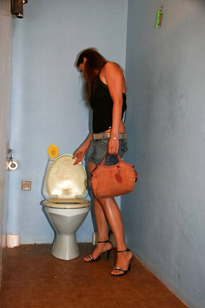 Seductive brunette slut enjoys gloryhole action in a public restroom - #6