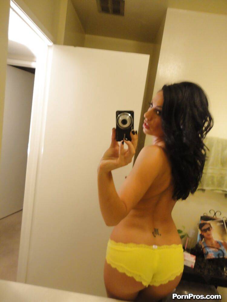 Brunette slut Tiffany Brookes taking mirror self shots while undressing | Photo: 1216667