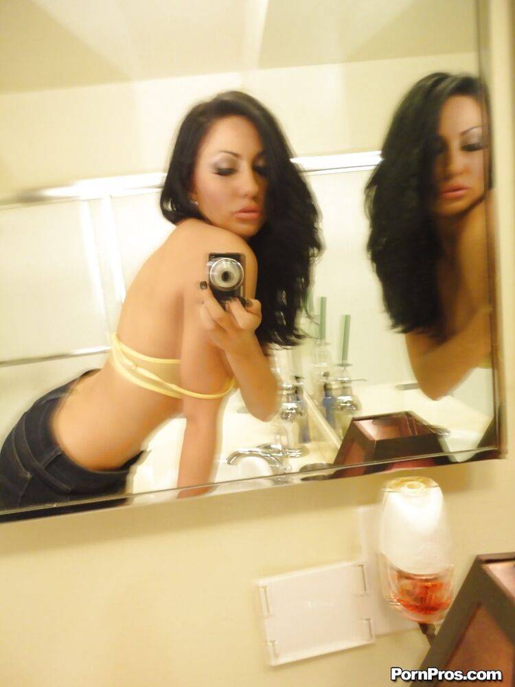 Brunette slut Tiffany Brookes taking mirror self shots while undressing | Photo: 1216715