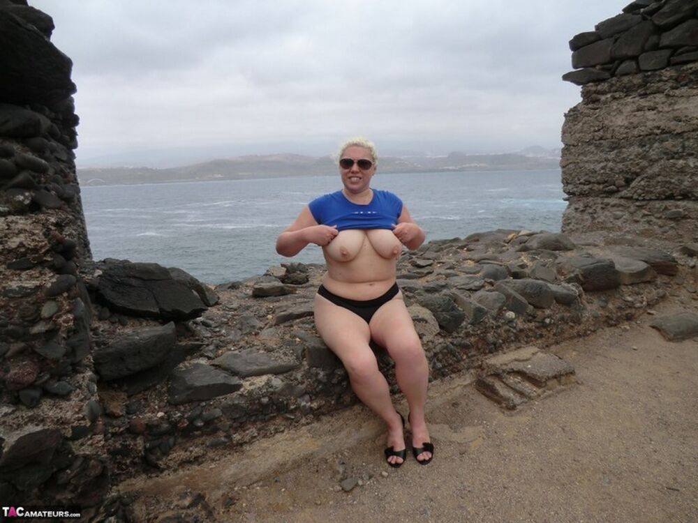 Mature amateur Barby gets totally naked in shades at a coastal location - #15