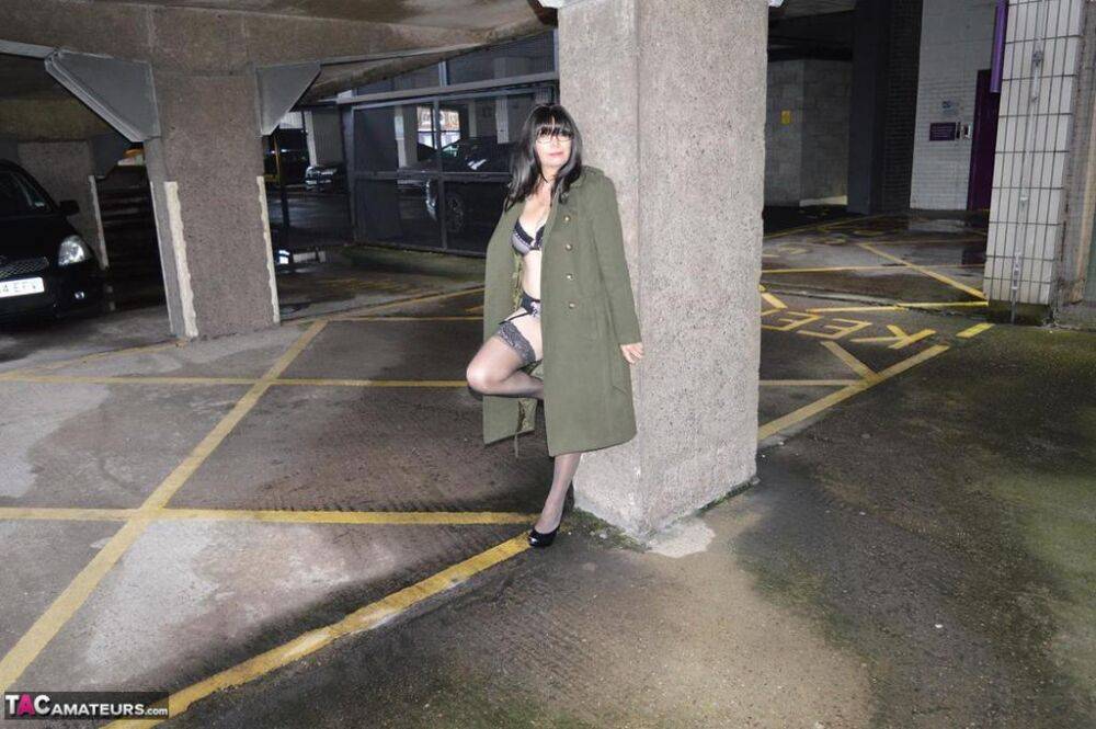 Older brunette Barby Slut flashes in a long coat while in public places - #12