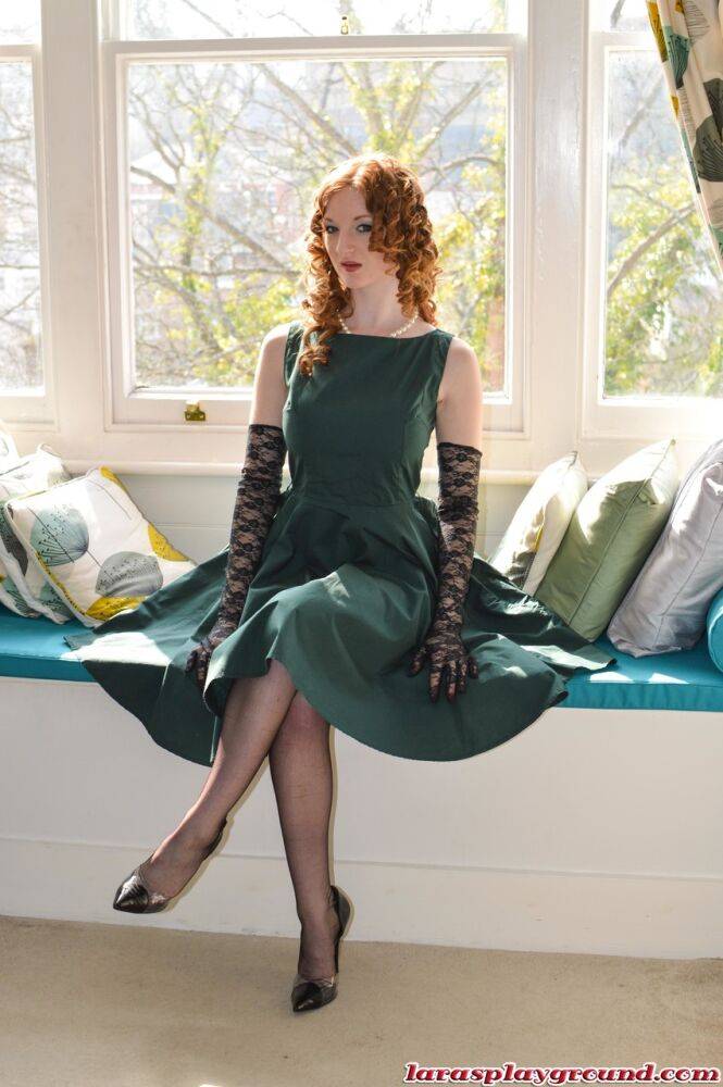Leggy MILF Lara Latex invites and redhead to pose with her by window in nylons - #13