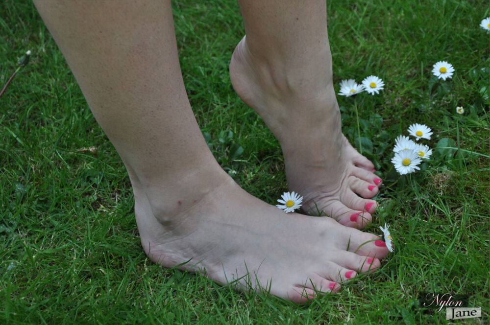 British woman Piage Turnah licks and sucks her own toes on the lawn - #3