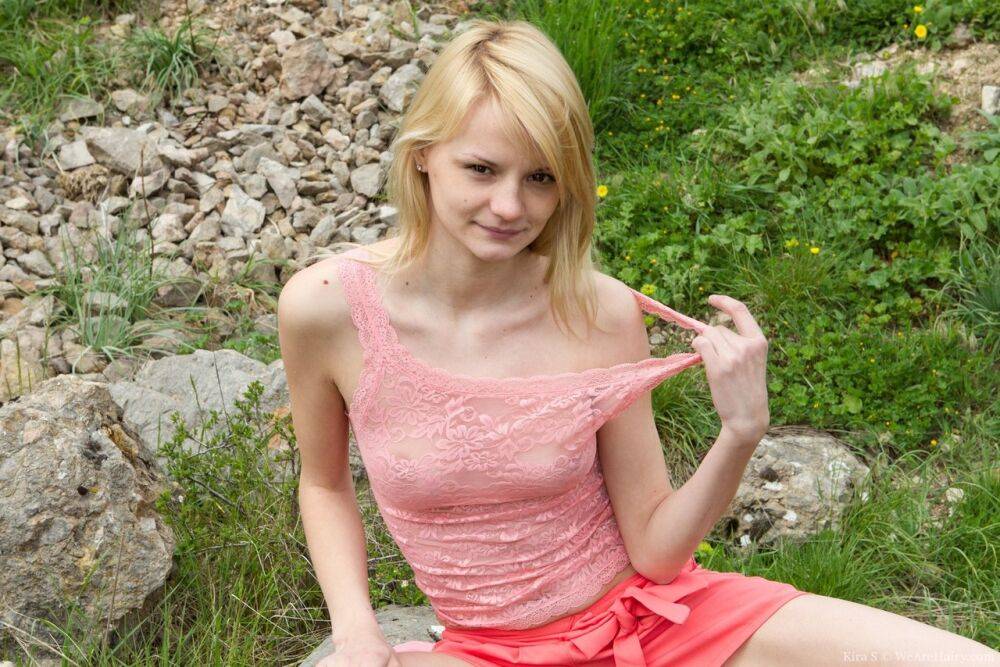 Skinny teen Kira S proudly parts her hairy pussy on a walk in countryside - #10
