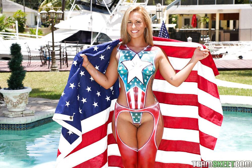 First timer Kelsi Monore showing off bald pussy while draped in USA flag - #12